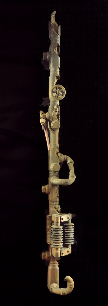 <strong>Riser (1996)</strong><br>
104”Hx11”Wx12”D<br>
Oil Painted Ceramic<br>
Private -- Collection