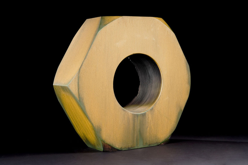 <strong>Large Hexagonal Nut (2006)</strong><br>
25”Hx27”Wx8”D<br>
Oil Painted Ceramic<br>
-- Collection: Flint Institute Of Arts